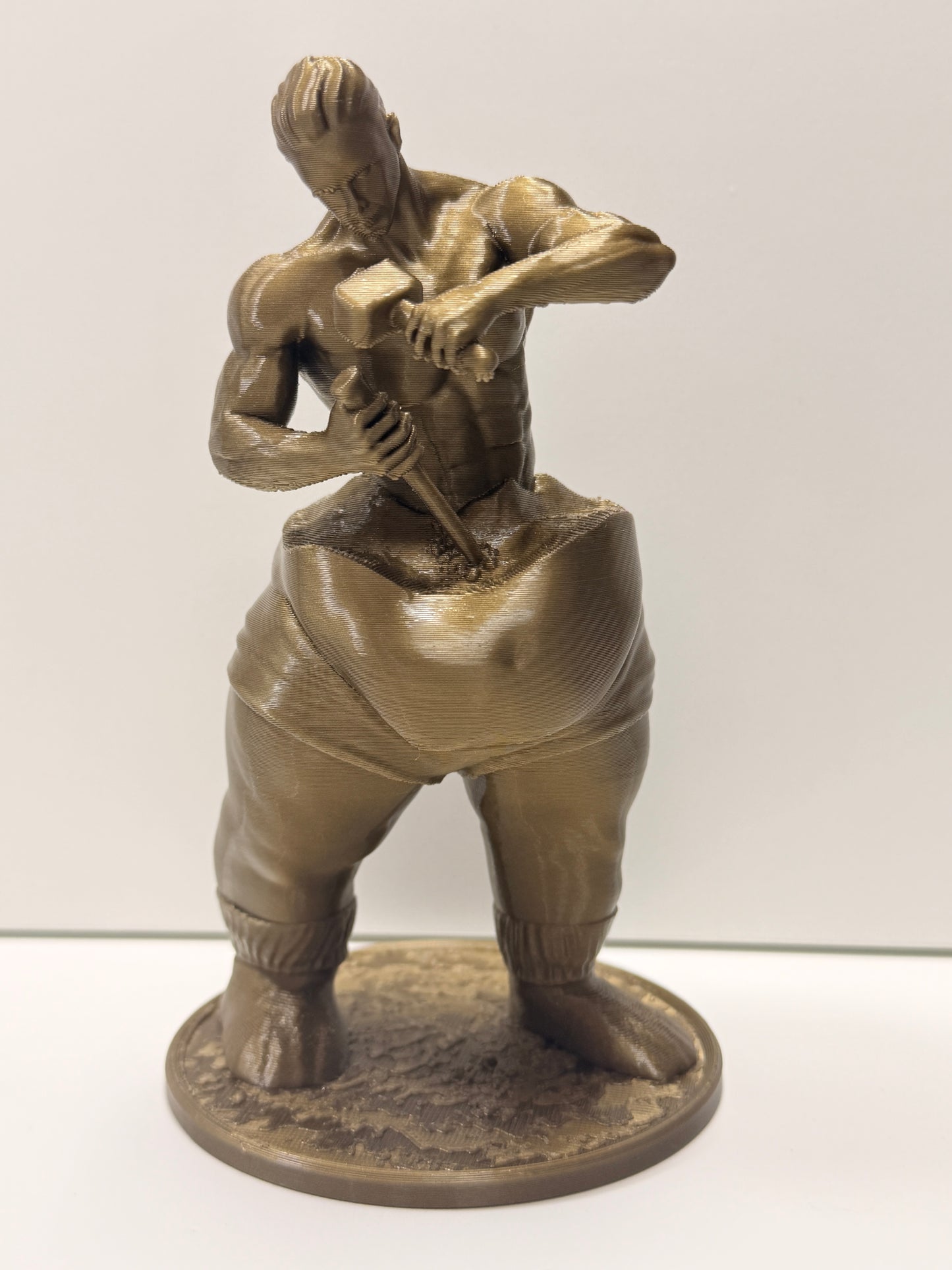 Statuetta "Self-Made Man" (L'Uomo che scolpisce se stesso)