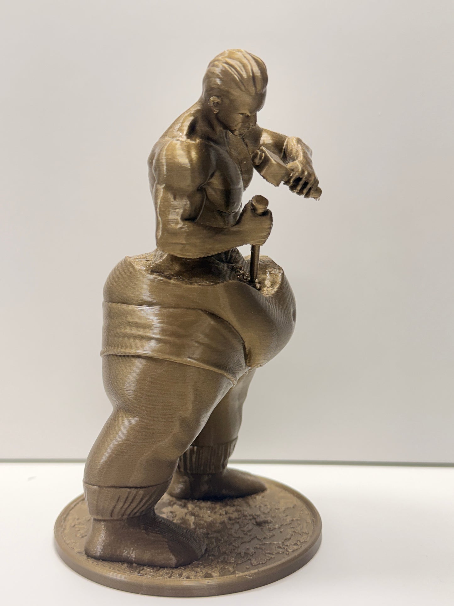 Statuetta "Self-Made Man" (L'Uomo che scolpisce se stesso)