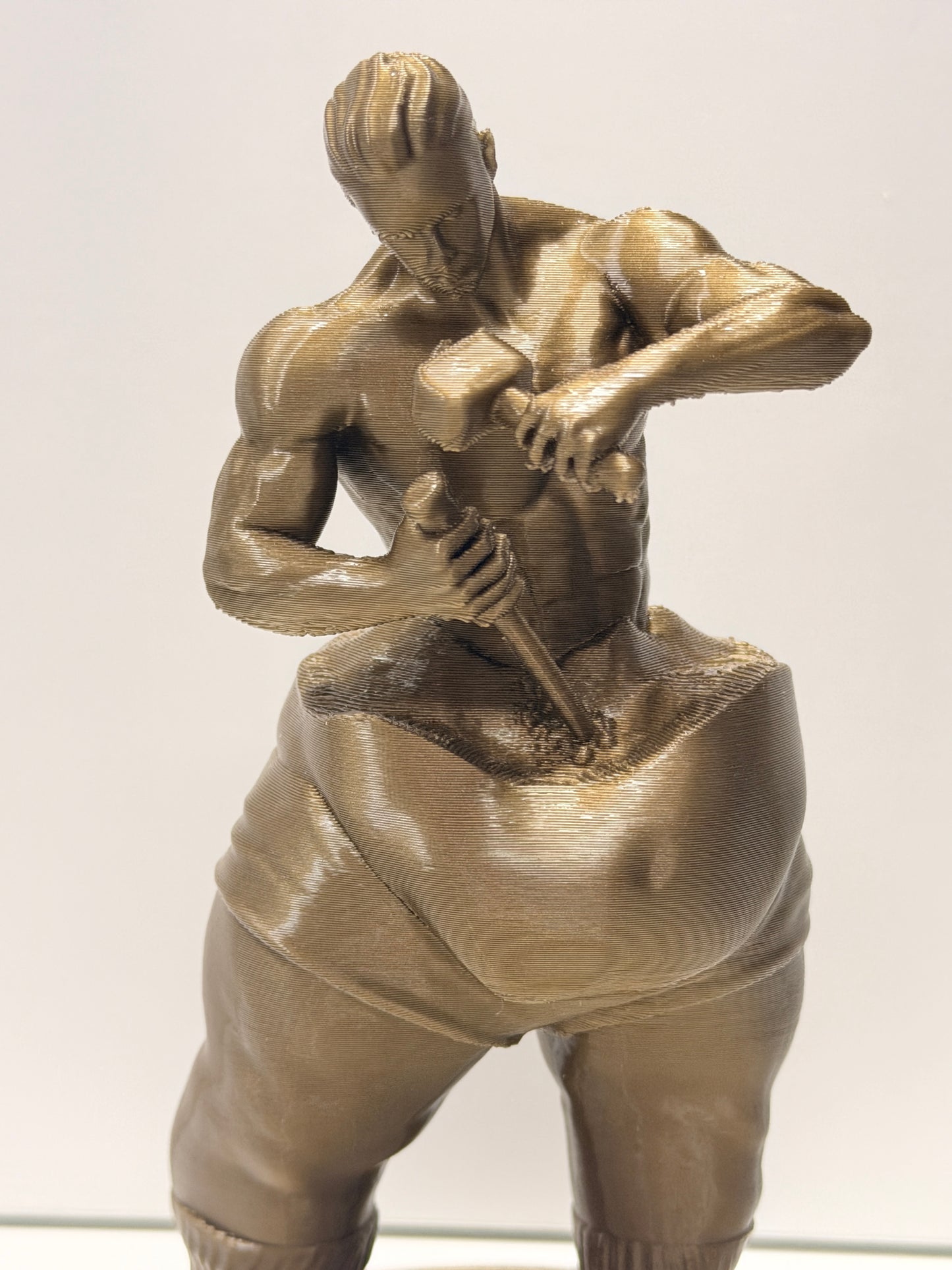 Statuetta "Self-Made Man" (L'Uomo che scolpisce se stesso)